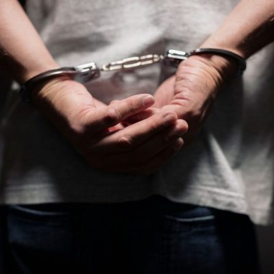criminal-in-handcuffs-PTNKNY4-1024x684