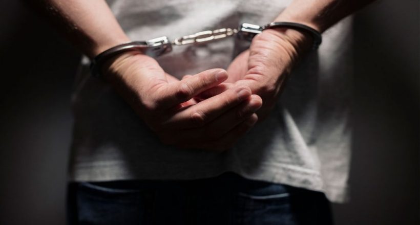 criminal-in-handcuffs-PTNKNY4-1024x684