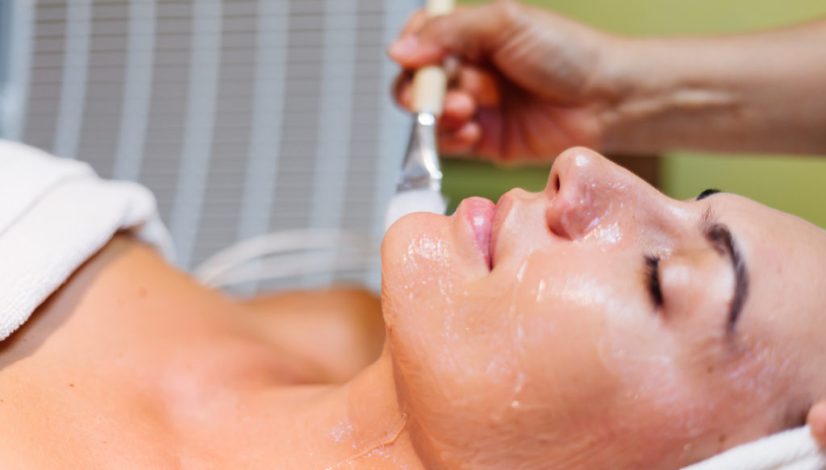 young-woman-lying-cosmetologist-s-table-during-rejuvenation-procedure
