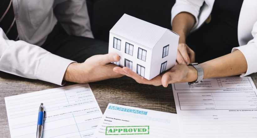 realtor-making-deal-with-customer-in-office